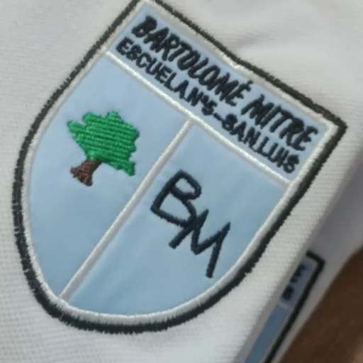 CHOMBA PIQUE PREMIUM ESCUELA BARTOLOMÉ MITRE
