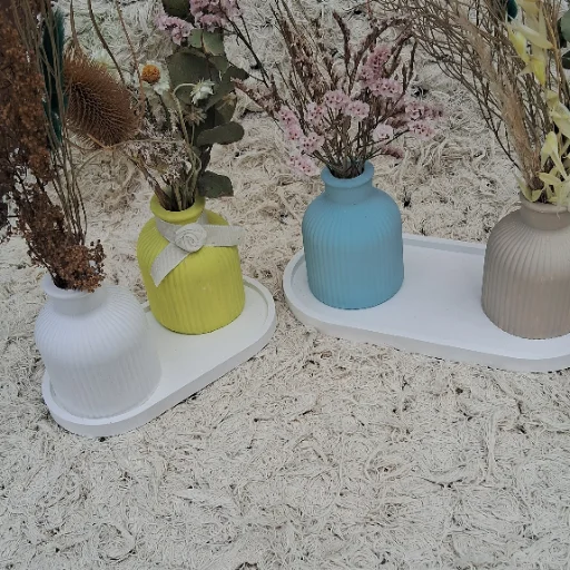 Kist de floreros bandejas y velas